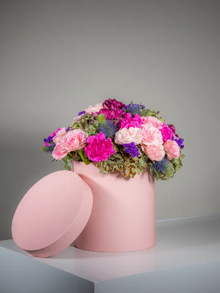 Flower box rosa di fiori rosa fuxia viola con coperchio